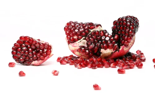 exotic-delicious-pomegranate-white-background_144627-12575
